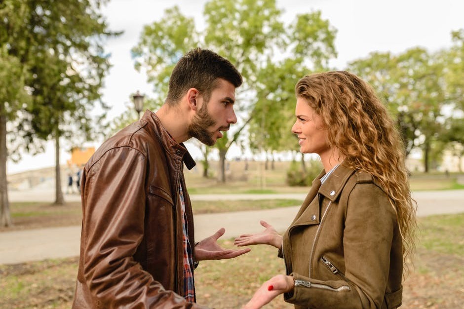 man and woman fighting