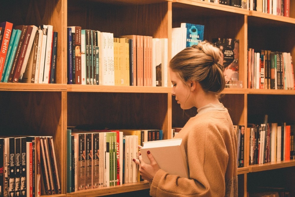 woman browsing in bookstore