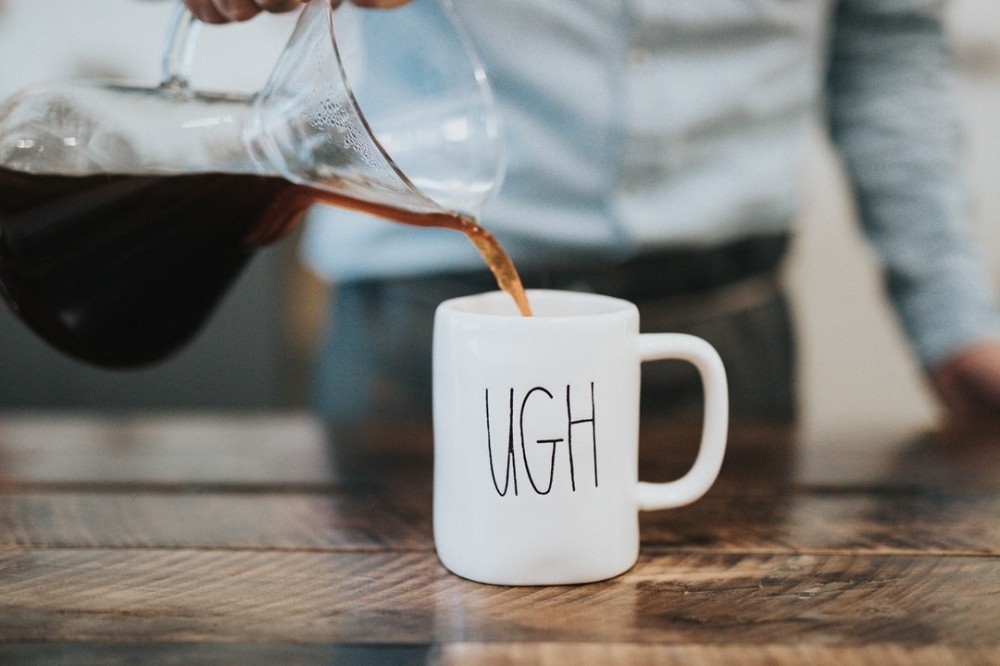 Coffee cup that says ugh